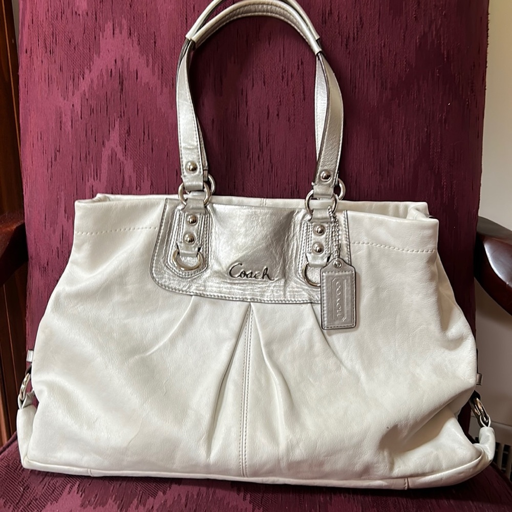 Coach cream colored leather bag, gorgeous pink lining